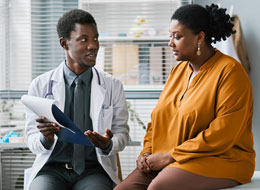 woman sitting in doctor office