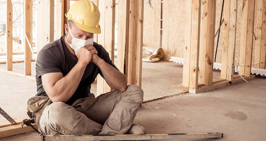 construction worker sitting on ground