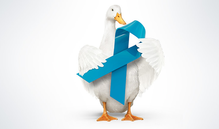 The Aflac Duck hilding a blue ribbon